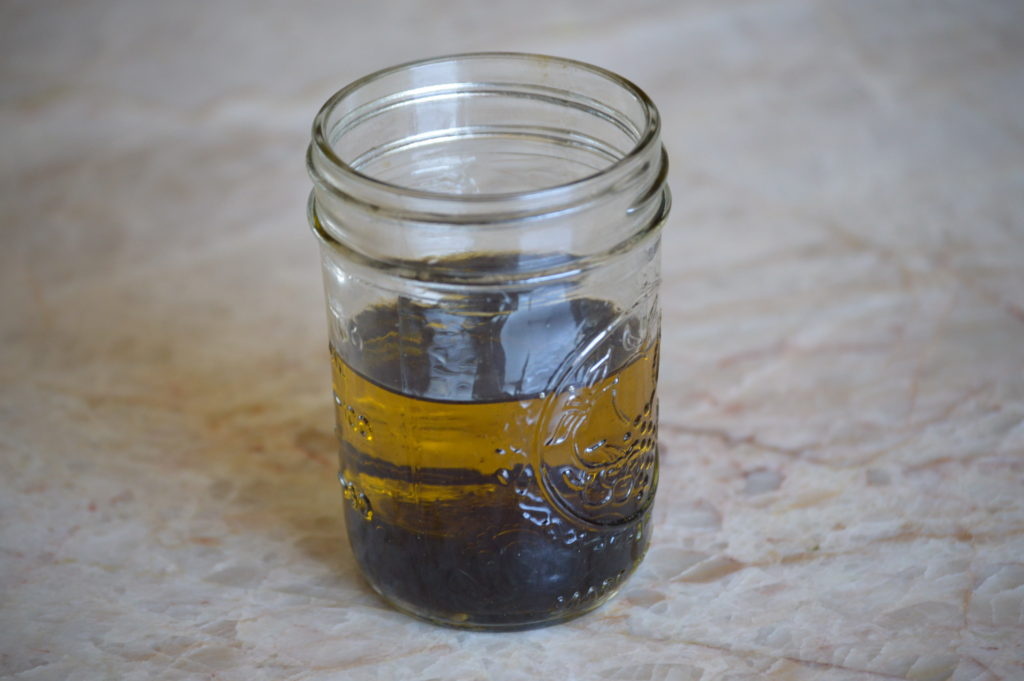the oil and vinegar in a jar
