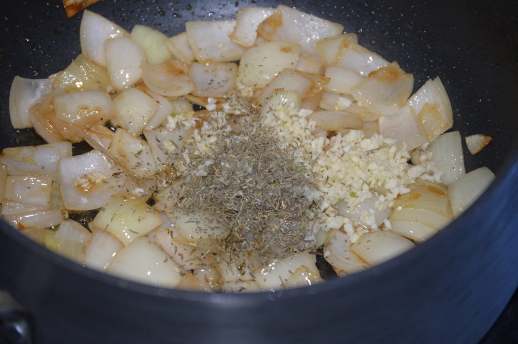 sauteing the onion garlis and thyme