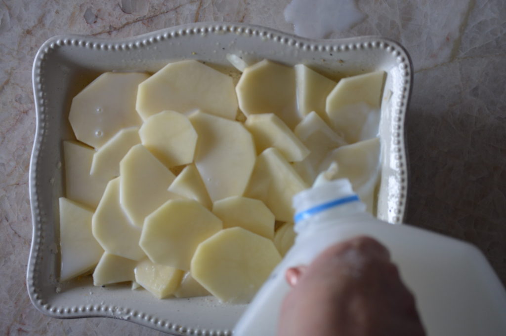 finnishing off the scalloped potatoes