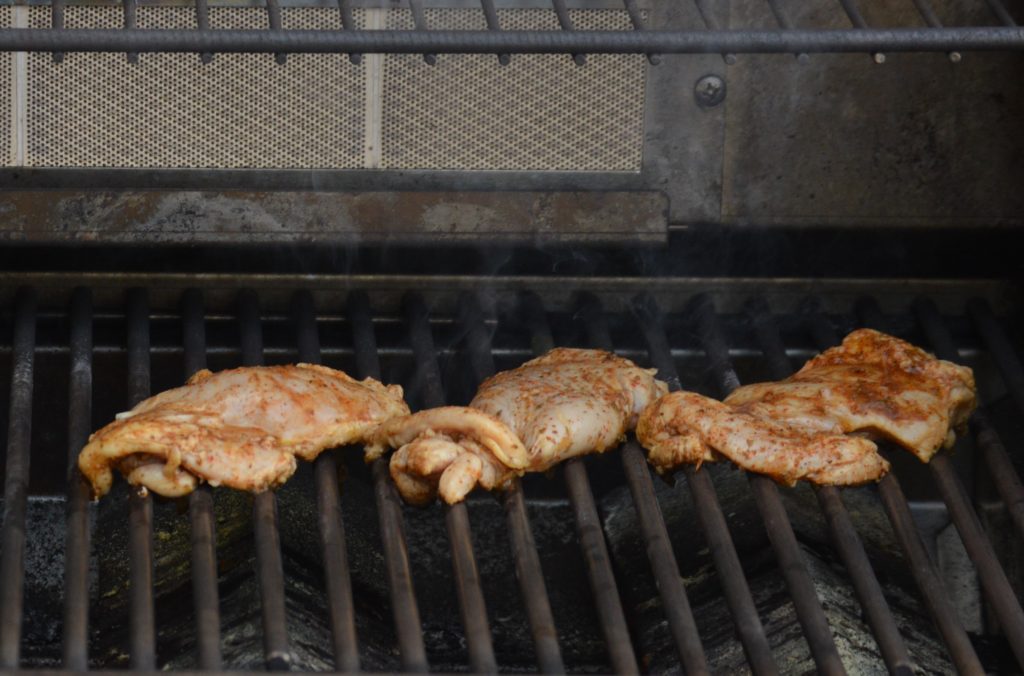 grilling the pollo asado