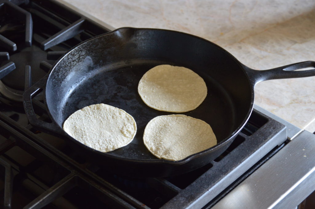 heating up the tortillas