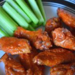 a plate of teh finished baked buffalo wings