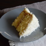 A slice of the layered coconut cake.