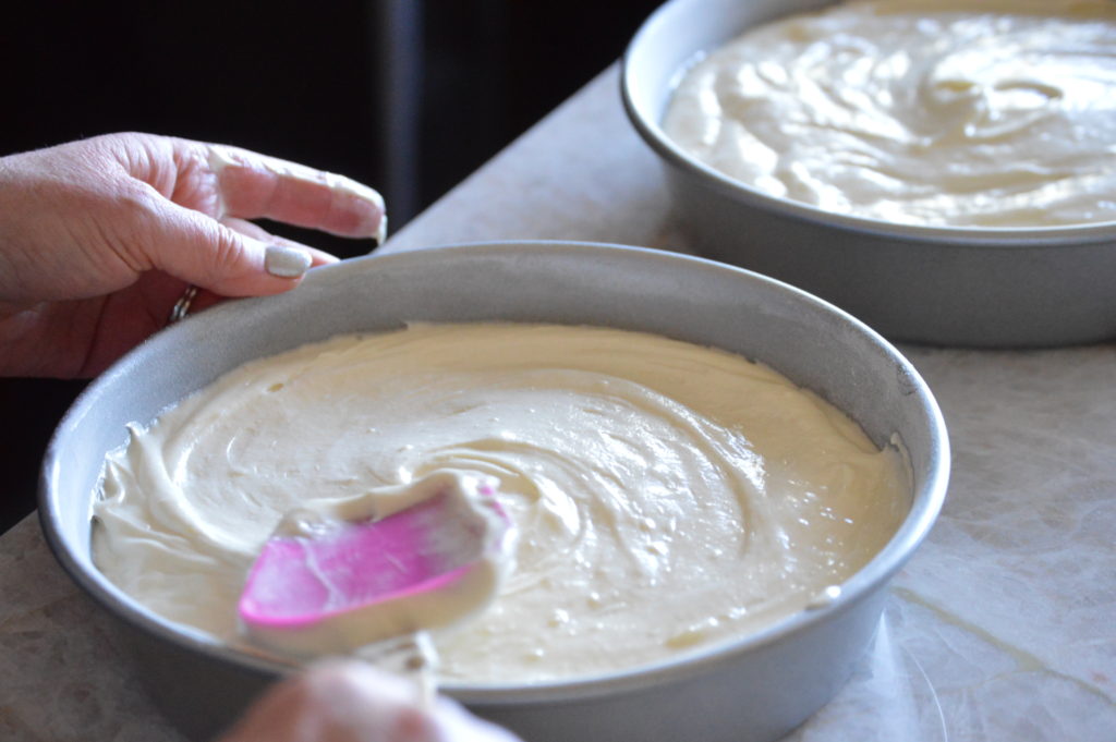 spreading out the cake batter so that it is even