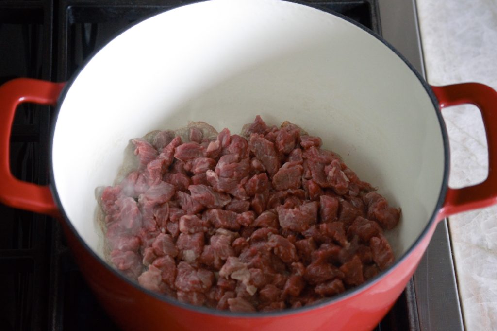 The beef added to the pot