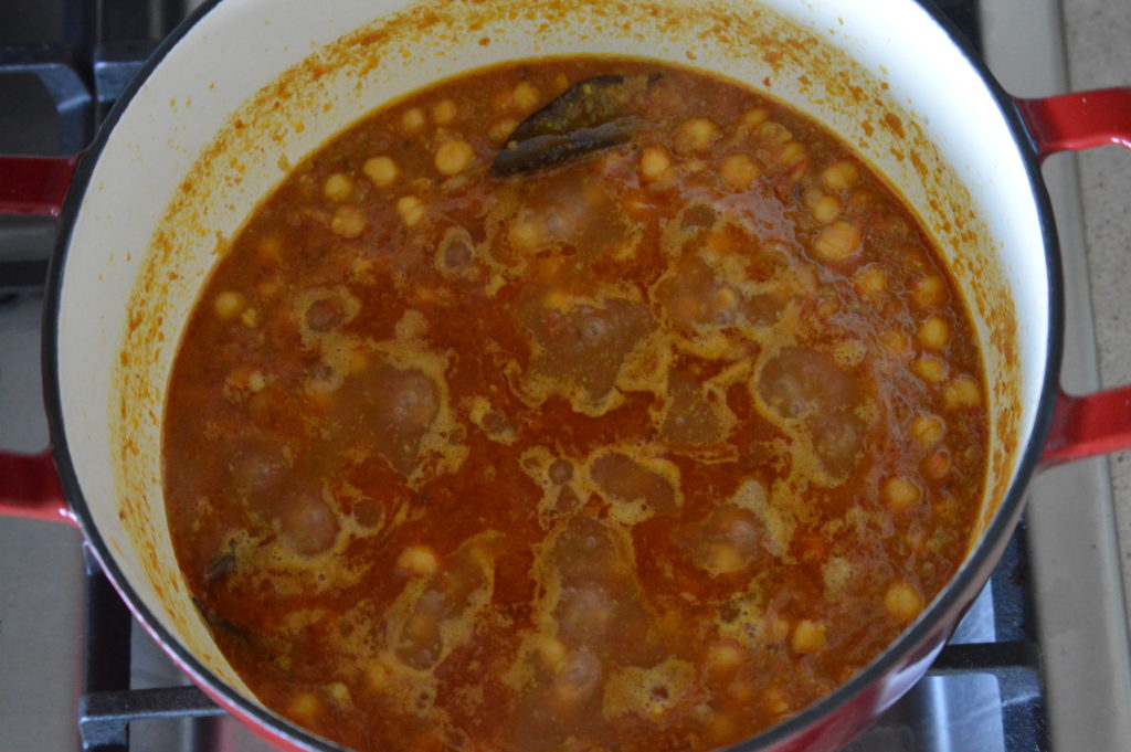 The chickpeas added to the pot along with water