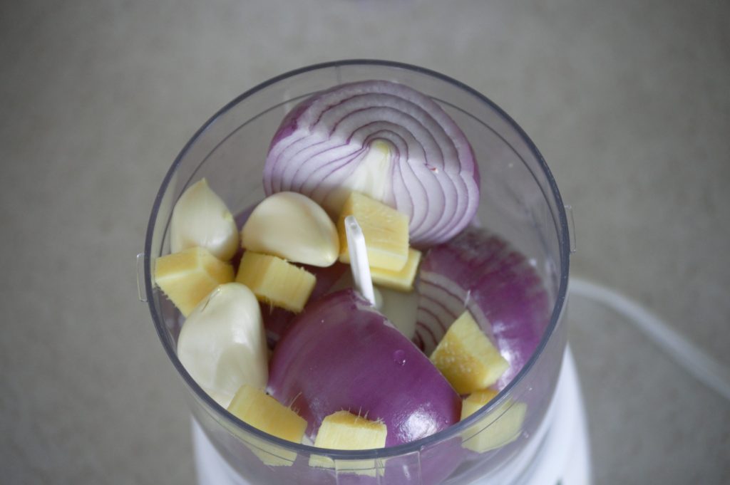 onions, garlic, and ginger before blending