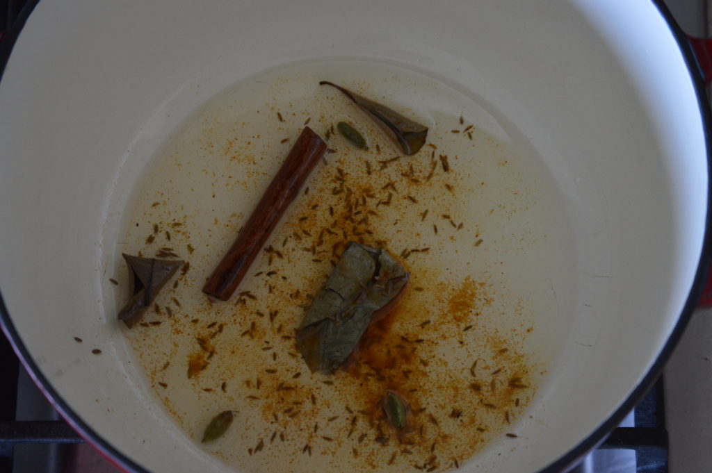 The masala spices added to the pot