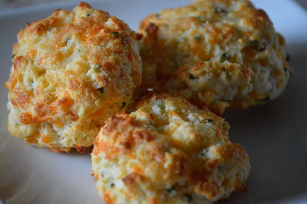 Three cheddar chive biscuits