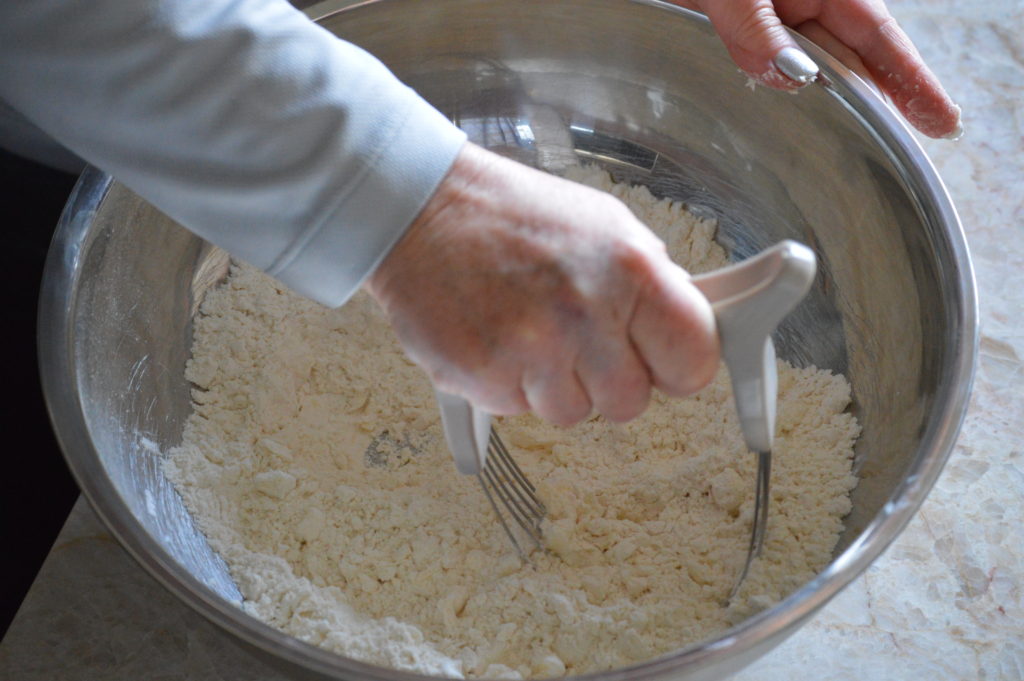 The butter being incorporated into the dough