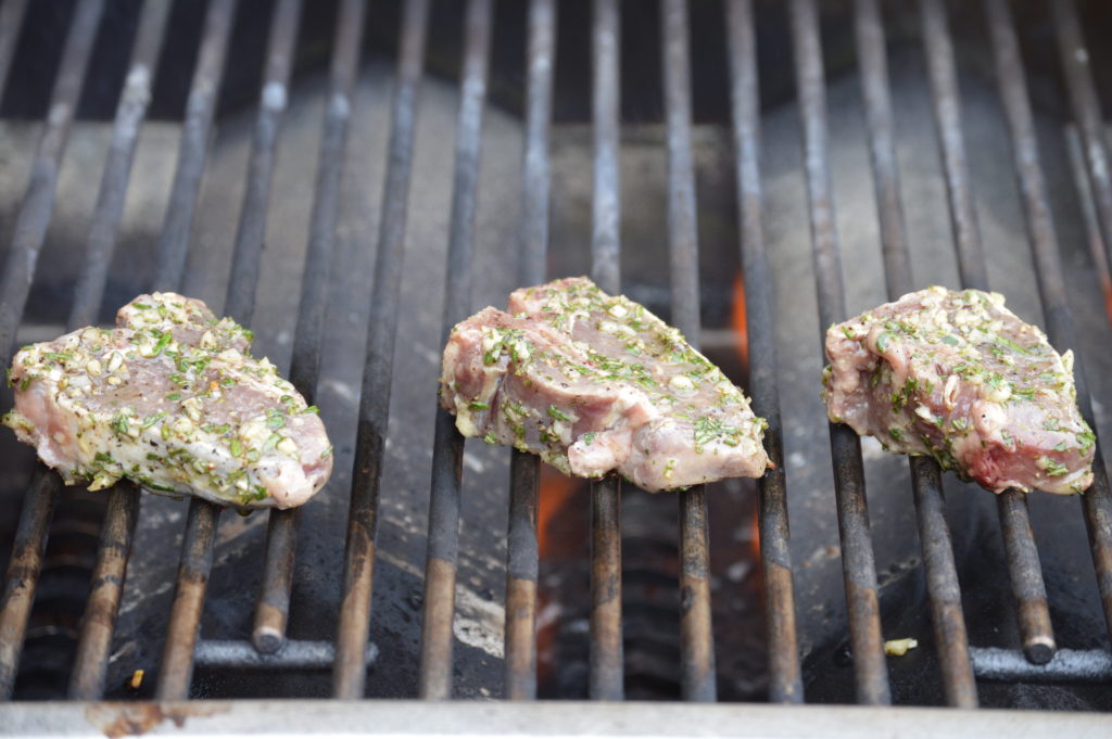 Grilling the chops on their first side