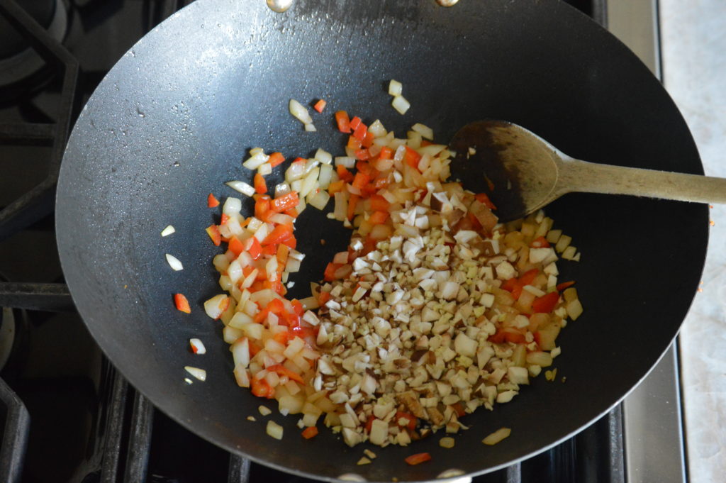 shiitake mushroom and garlic added to the wok