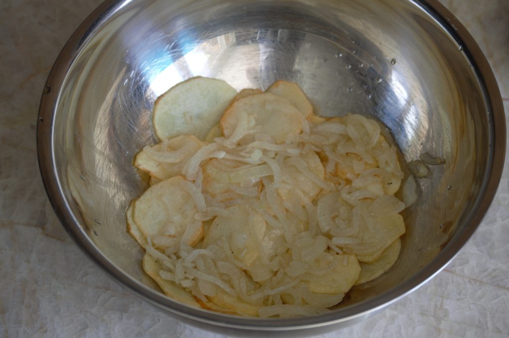 the onions added to the potatoes