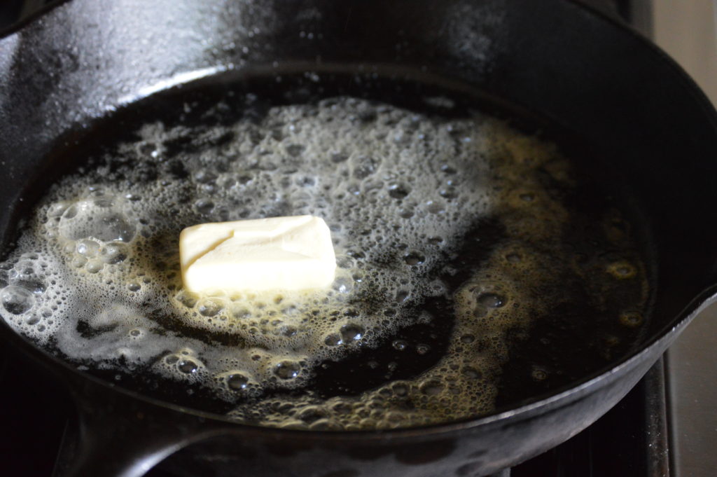 butter melting in the skillet