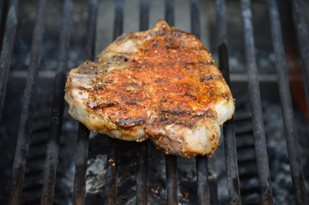 grilling the dry rubbed pork chops