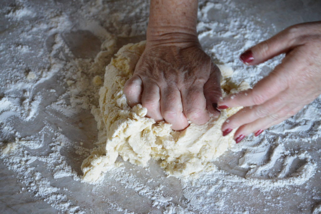 kneeding the English scone dough together