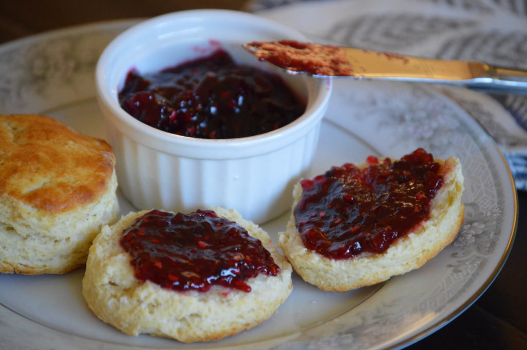 enjoying the english scones with some jam