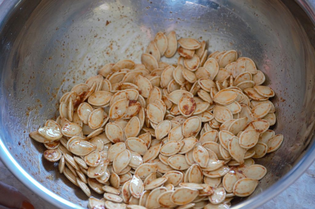 the oil and spices added to the seeds
