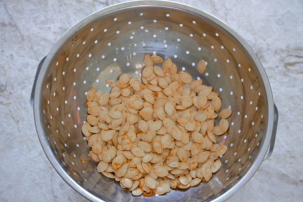pumpkin seeds in a colander
