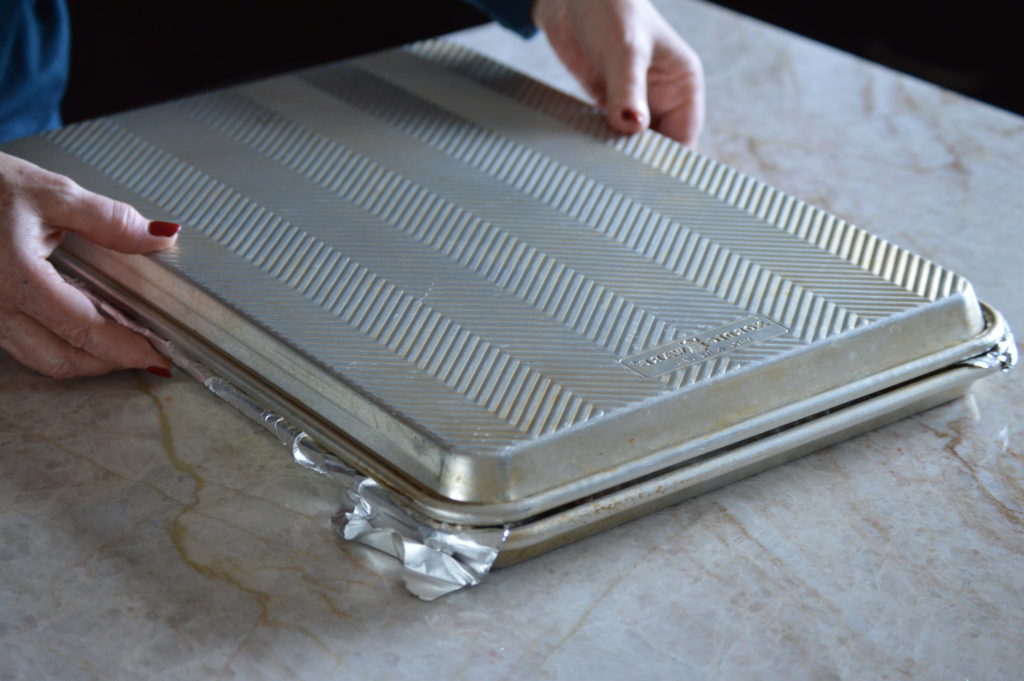 covering the other baking sheet 