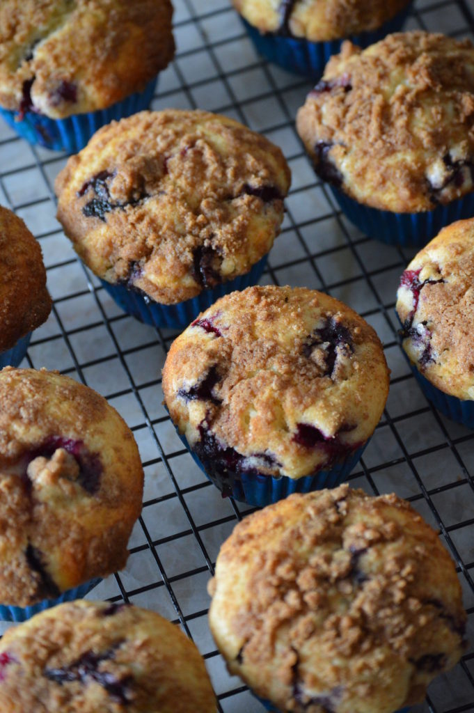 the blueberry muffins cooling on a rack