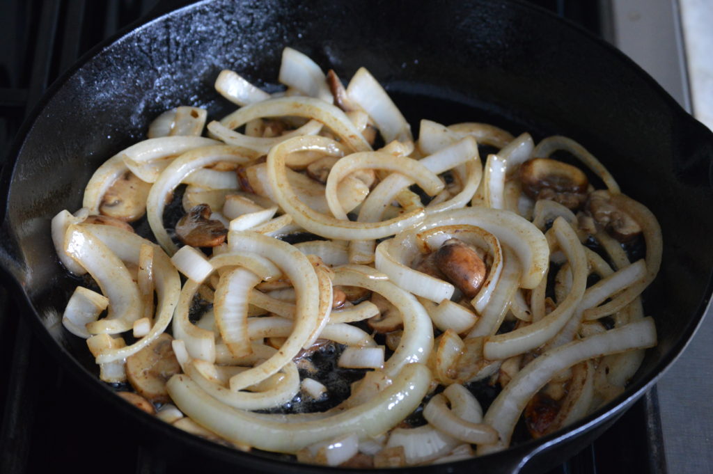 sauteing the onion and mushrooms
