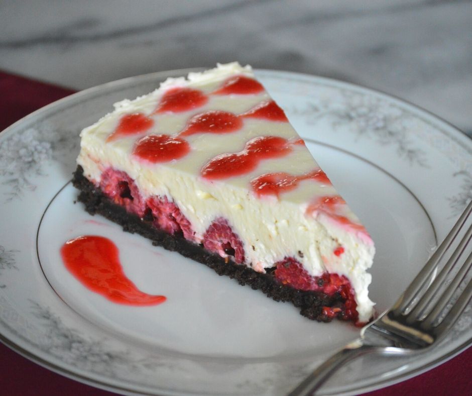 a slice of the white chocolate raspberry cheesecake