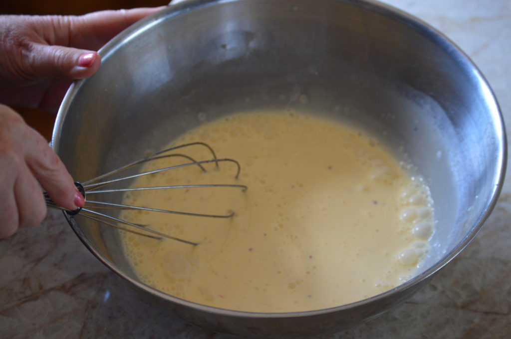 whisking together the quiche lorraine filling