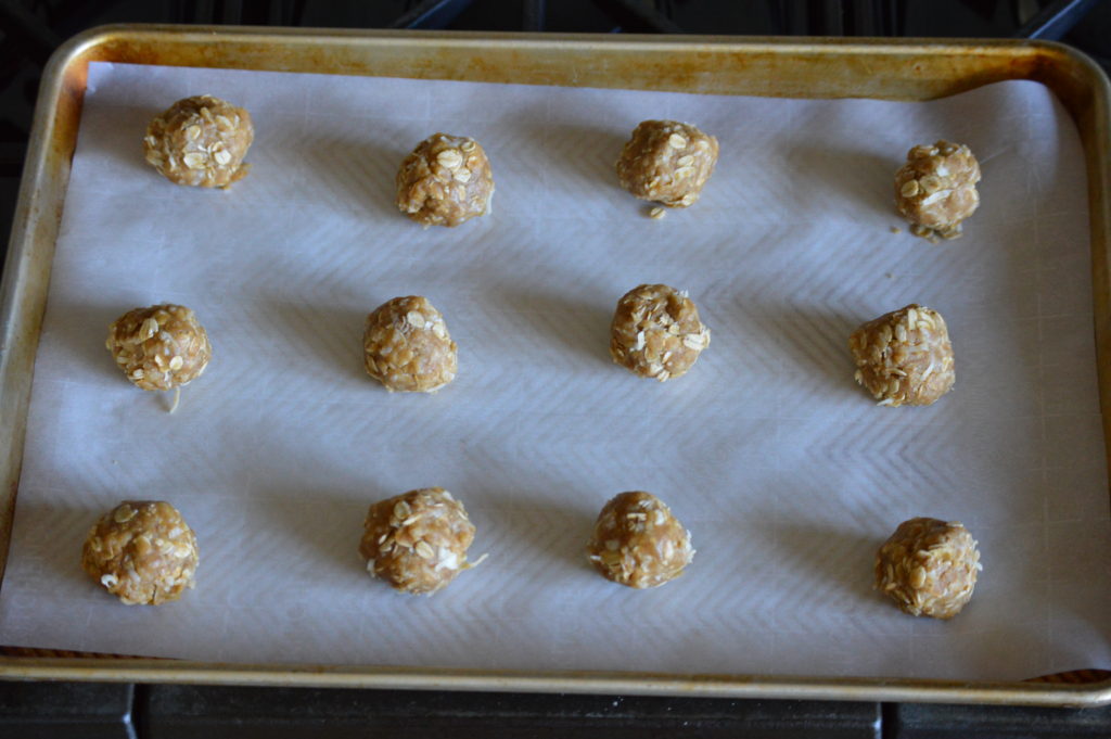 the balls of dough on a baking sheet