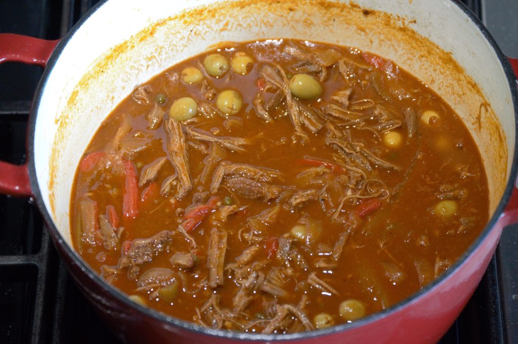 finishing the ropa vieja before serving