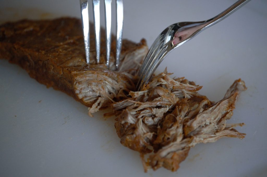 shreading the beef for the ropa vieja