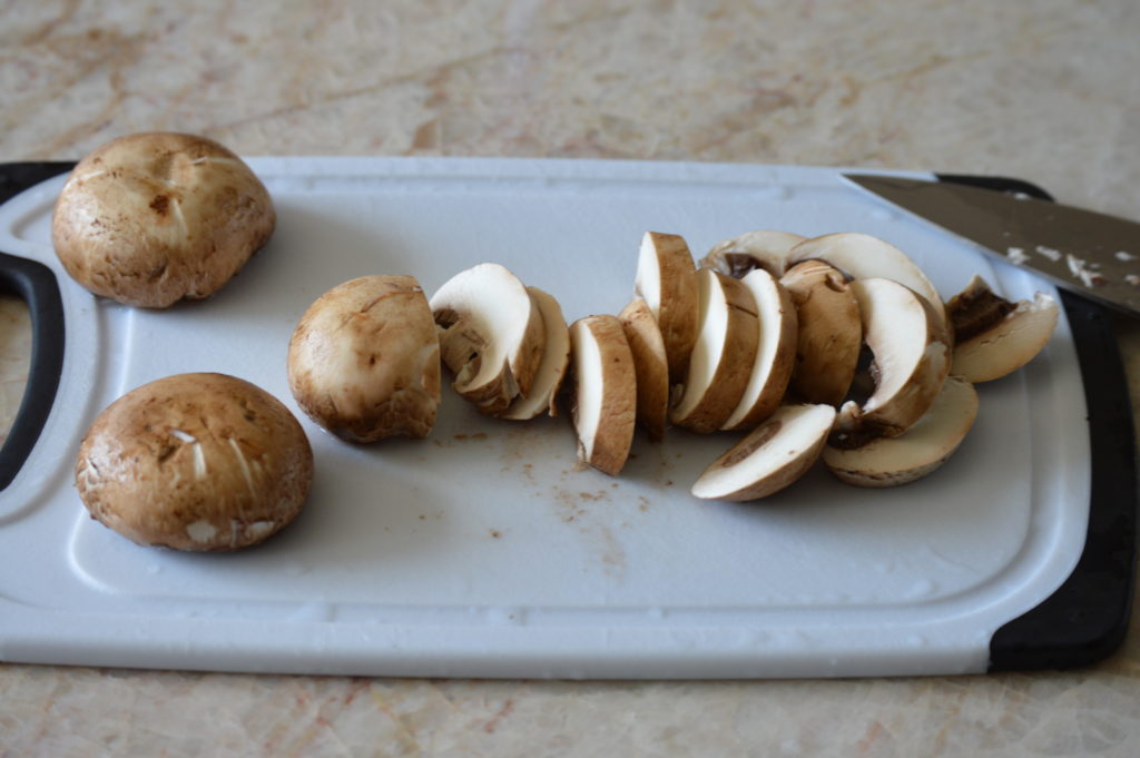 slicing up the mushrooms