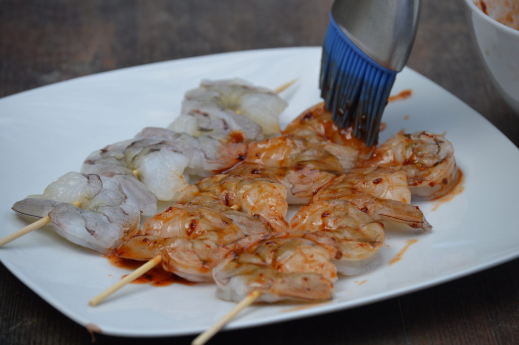 basting one side of the shrimp