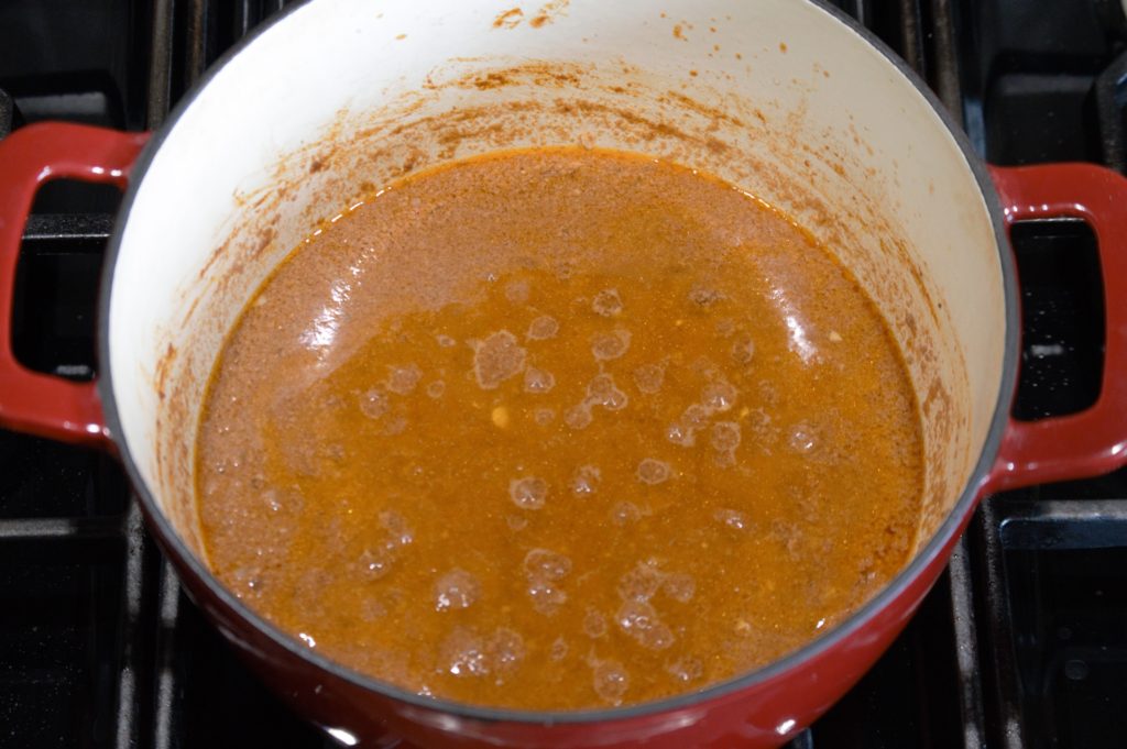 the chili sauce simmering