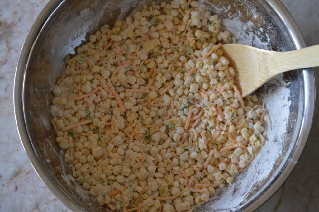 the corn, cheese, green onions, and jalapenos to the dry ingredients.