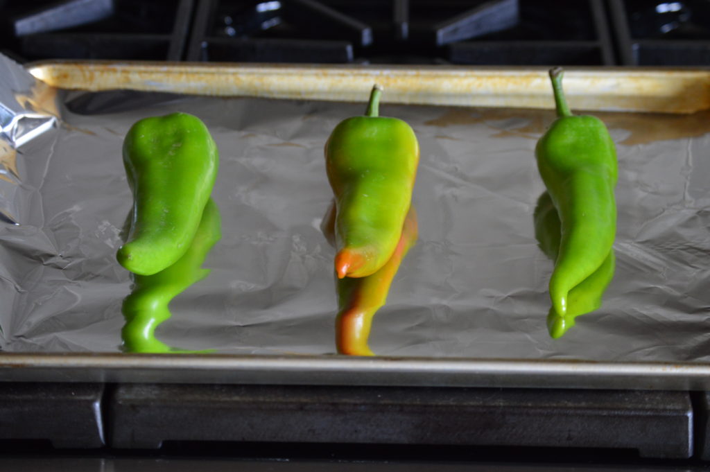 3 chilis on a baking sheet