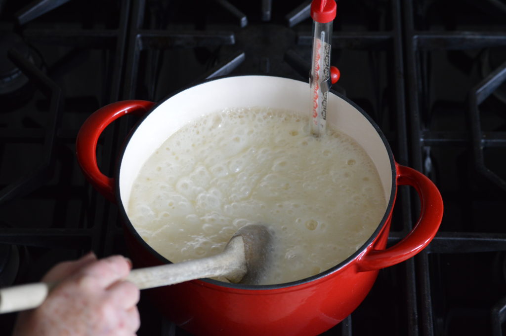 cooking the sugar, butter, and evaporated milk