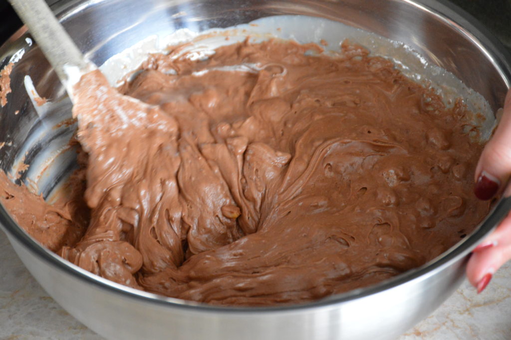mixing together the fudge ingredients