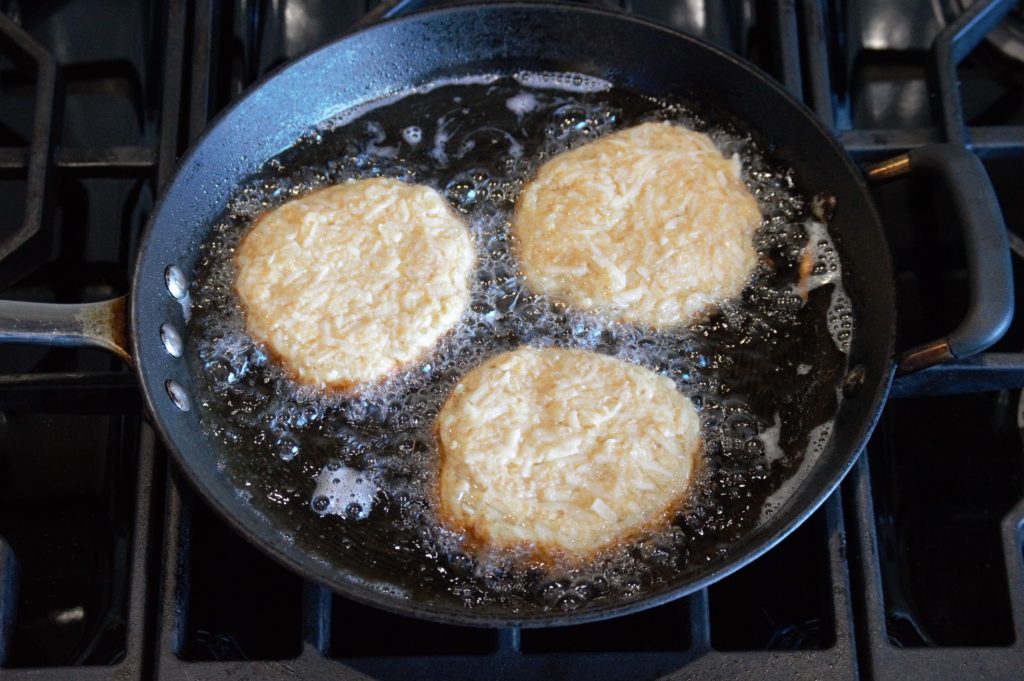 frying the latkes on one side