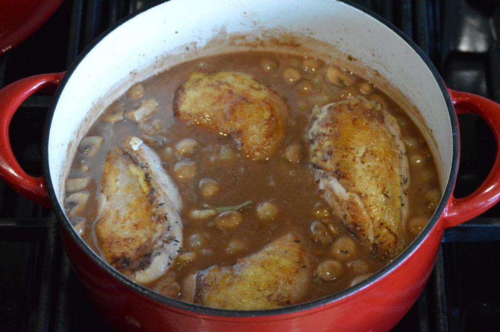the chicken is added back to the pot