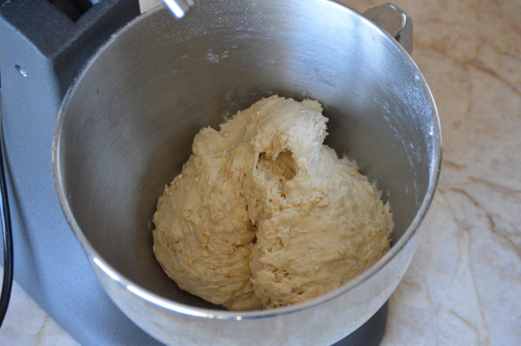 the honey oat bread dough kneaded together