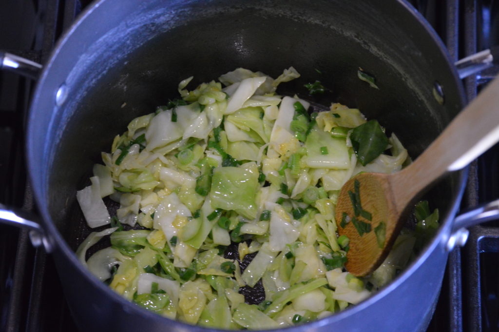 sautéing cabbage and green onion 