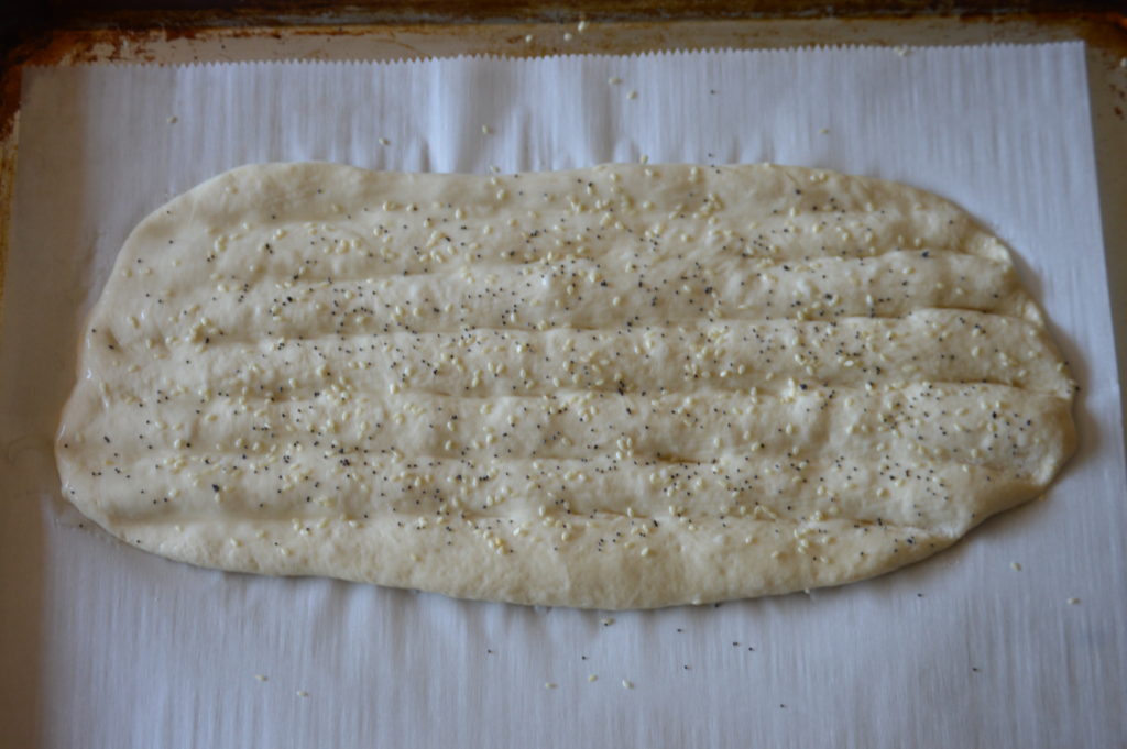 the glaze and seeds are added to the dough