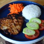 the finished lemongrass pork chop with some sides
