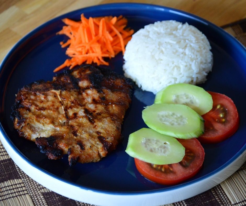 the finished lemongrass pork chop with some sides