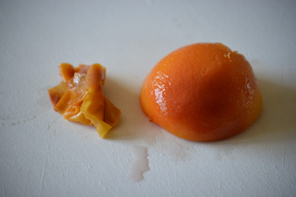 the skin is removed from the poached peaches