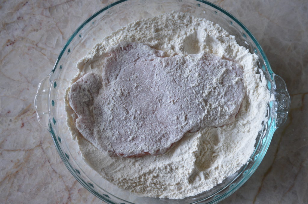 the pork loin chop dredged in flour
