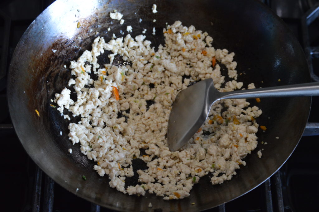 the chicken is added and stir fried