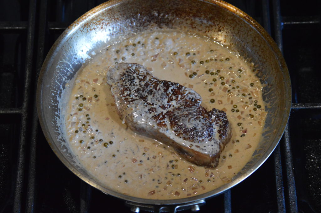 the steak au poivre is almost done