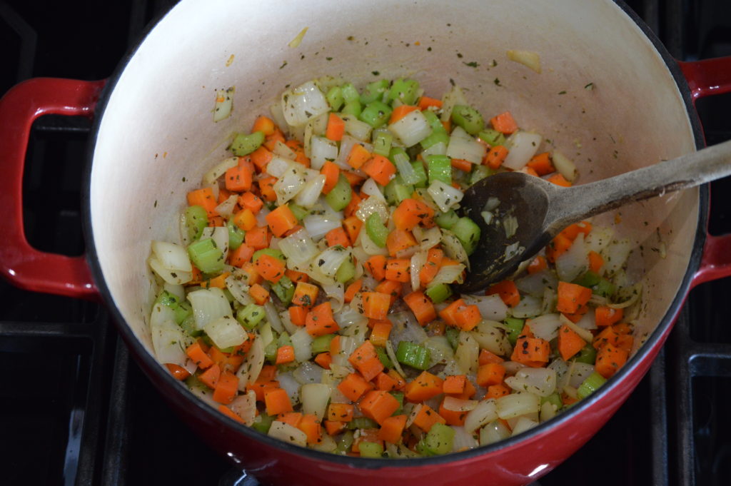 sauteing the vegetables and herbs